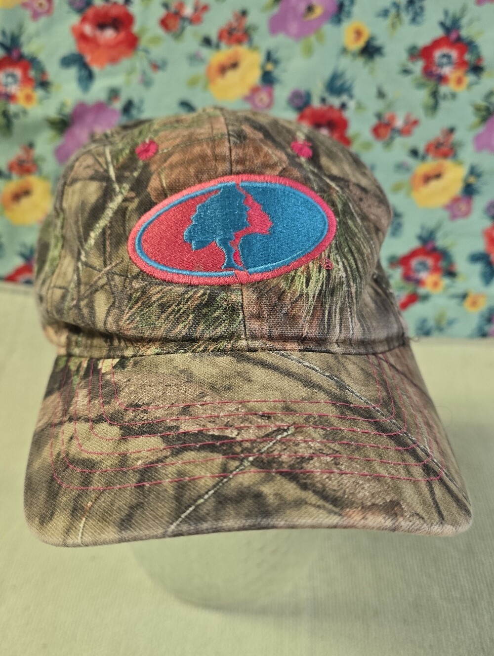 Mossy Oak Camo Hat with Pink and Teal Logo